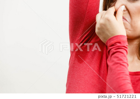 Woman sweating very badly have wet armpit Woman sweating very badly have wet armpit 51721221