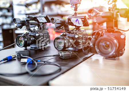 Behind the scenes of video production or video shooting. The concept of production of video content Behind the scenes of video production or video shooting. The concept of production of video content 51754149