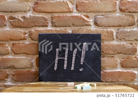 Black board with the word HI! drown by hand on 51765722