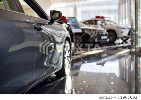 Car auto dealership. Themed blur background. Car auto dealership. Themed blur background. 51965602
