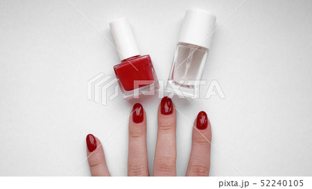 Beautiful female hands. Hand skin care. Beautiful Woman Hands With Red Manicure 52240105