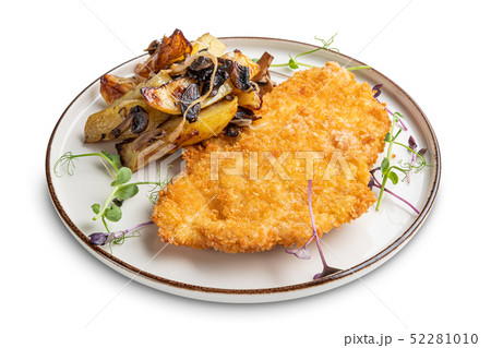 Tasty schnitzel in breading with fried potato Tasty schnitzel in breading with fried potato 52281010
