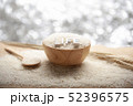 Jasmine rice in a wooden bowl with LIFE 3D text 52396575