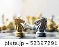Silver and gold horse chess on board 52397291