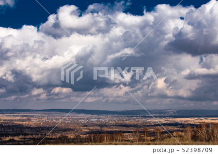 big clouds above the ground big clouds above the ground 52398709