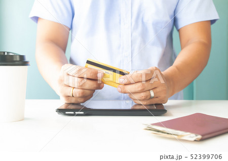 Man hand holding plastic credit card. E-payment, 52399706