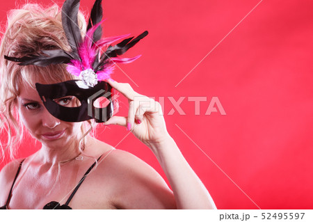 Woman with carnival mask. 52495597
