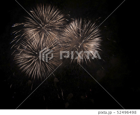 Fireworks against the dark sky. Bright salute in the black sky, Fireworks against the dark sky. Bright salute in the black sky, 52496498