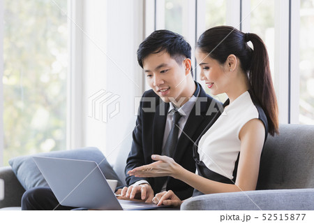Asian business people using laptop in office.. 52515877