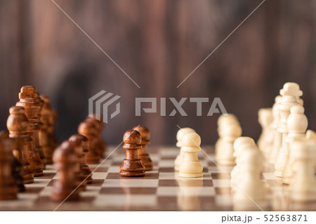 wooden chess endways on the board 52563871