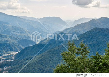 The gorge among the mountains with green slopes. 52592500