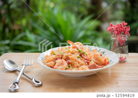 Delicious Thai fried rice with shrimp on wooden Delicious Thai fried rice with shrimp on wooden 52594819