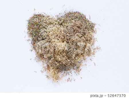 Heap of colour dust from pencils in heart-shaped o 52647370