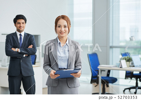 Female leader working at office Female leader working at office 52703353