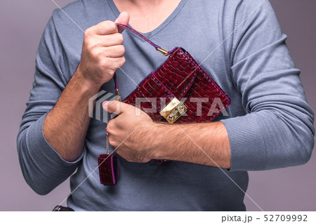 Modern leather bag in hands Modern leather bag in hands 52709992