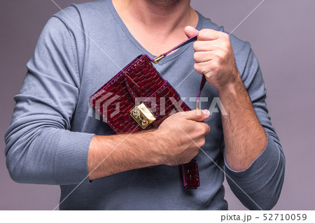Modern leather bag in hands Modern leather bag in hands 52710059