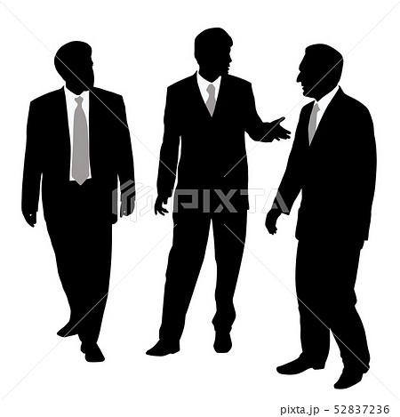 Group of three businessmen walking and talking Group of three businessmen walking and talking 52837236