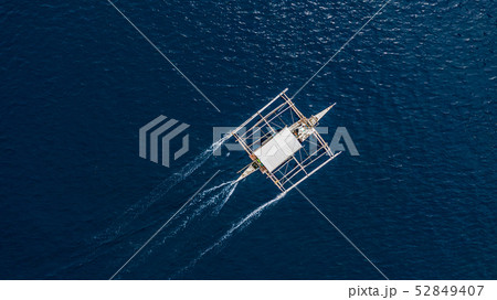 Aerial view of Filipino boats floating on sea Aerial view of Filipino boats floating on sea 52849407