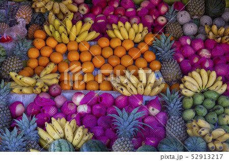 Watermelon, Banana, Orange, Pineapple and Other Fruit on Stand 52913217