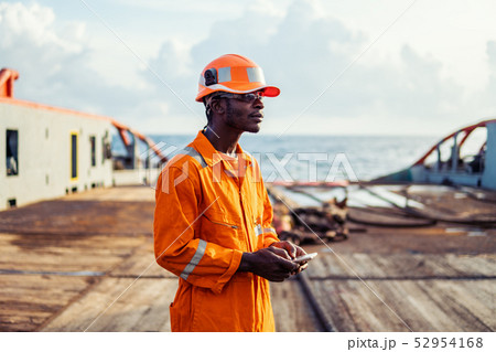 Tired Seaman AB or Bosun on deck of vessel or ship Tired Seaman AB or Bosun on deck of vessel or ship 52954168