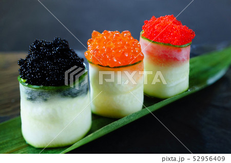 Red and tobiko caviar topped sushi rolls set Red and tobiko caviar topped sushi rolls set 52956409