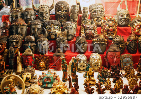 Colorful carved masks are sold, colored masks of 52956887