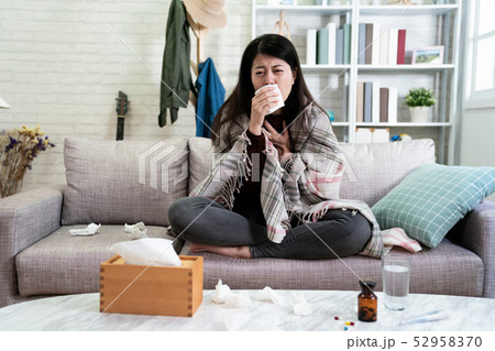Cold medicine and sick asian woman Cold medicine and sick asian woman 52958370
