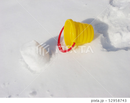 Kids winter play objects. Bucket on a snow 52958743