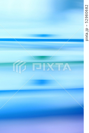 抽象的背景素材 青 緑色系 緩やかなラインの写真素材