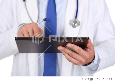 Therapeutist using portable computer searching information Therapeutist using portable computer searching information 52960853