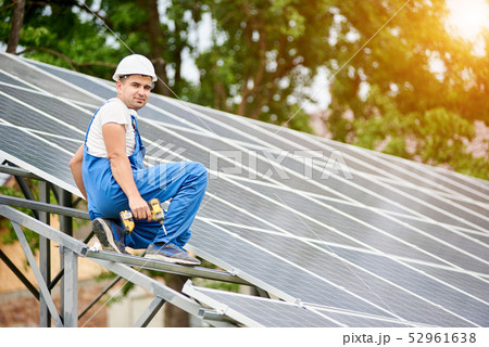 Installing of solar photo voltaic panel system Installing of solar photo voltaic panel system 52961638