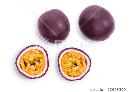 Two whole passion fruits and a half isolated on white background. Isolated maracuya. Top view. Flat Two whole passion fruits and a half isolated on white background. Isolated maracuya. Top view. Flat 52963500