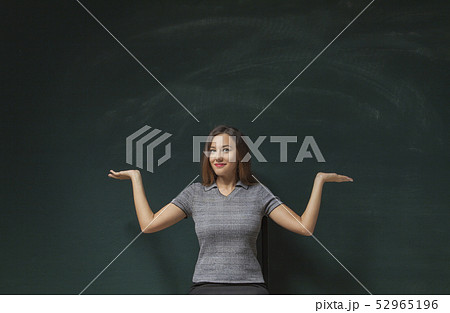 Portrait of confused businesswoman 52965196