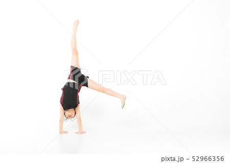 Asian girl standing and posing in gymnastic pose 52966356