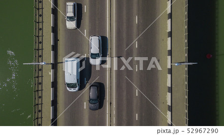 Drone's Eye View - Aerial top down view of urban traffic jam on bridge Drone's Eye View - Aerial top down view of urban traffic jam on bridge 52967290