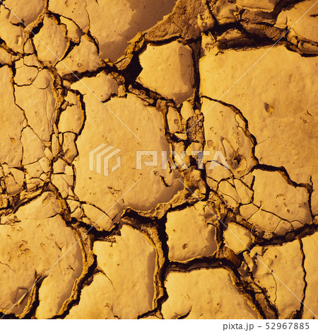 Dried mud background and climate change symbol Dried mud background and climate change symbol 52967885