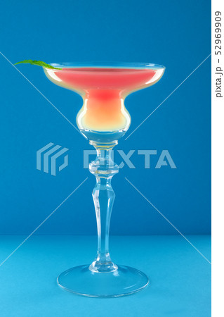 Classic Scofflaw Cocktail on blue background 52969909