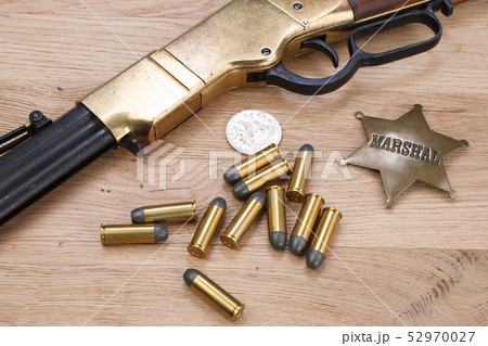 Wild west gun with ammunition and marshal badge 52970027