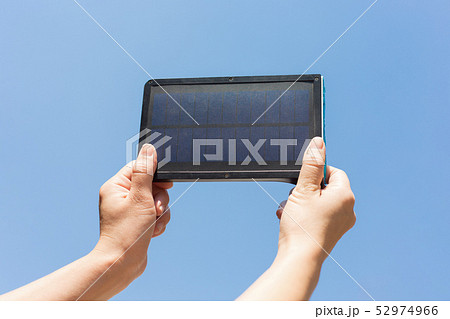 Woman hand holding Solar cell panal. 52974966