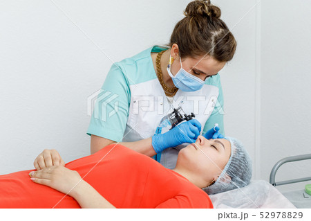 Permanent makeup, tattooing of eyebrows. 52978829