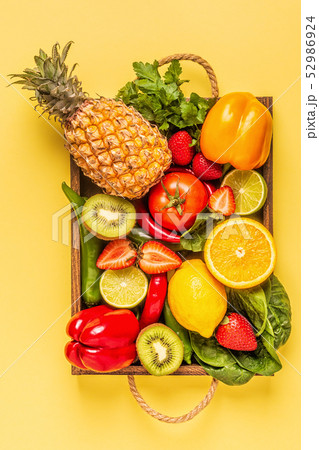 Fruits and vegetables rich in vitamin C in box. 52986924