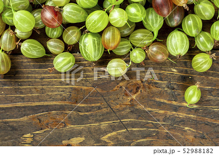 gooseberry scattered on the table 52988182