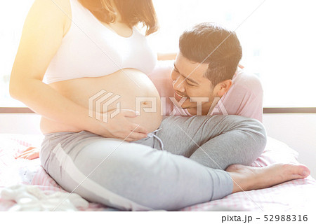 Asian pregnant woman. Mom and newborn baby.  52988316