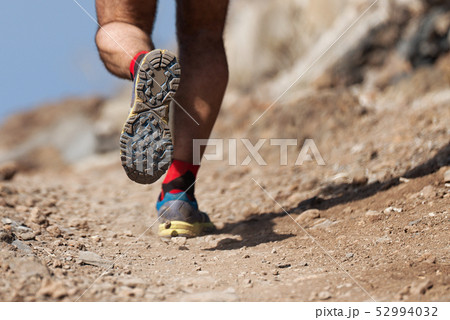 Trail running action 52994032
