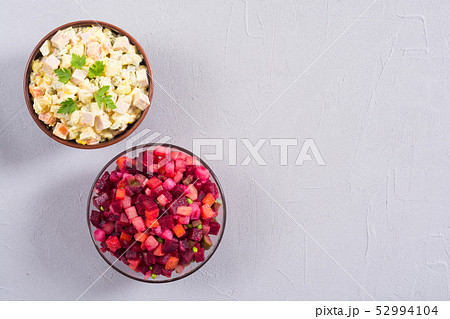 Traditional Russian salad olivier andvinaigrette Traditional Russian salad olivier andvinaigrette 52994104