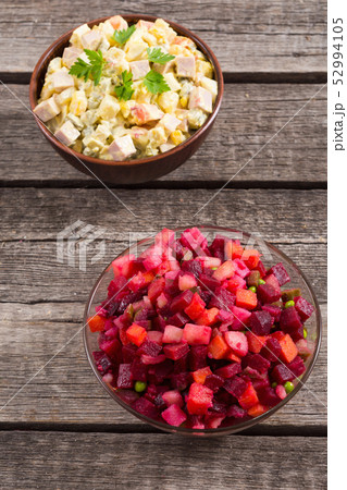 Traditional Russian salad olivier andvinaigrette Traditional Russian salad olivier andvinaigrette 52994105