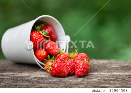 ripe strawberries on wooden table ripe strawberries on wooden table 52994563