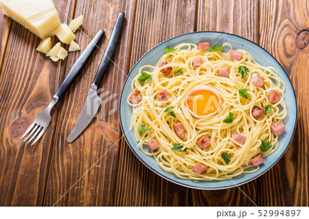 Itslian pasta carbonara with sausage and egg 52994897