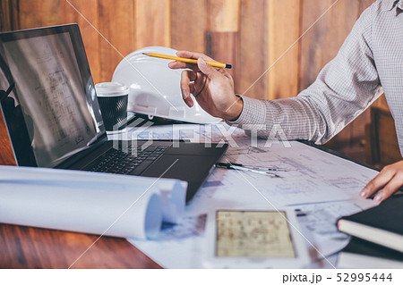 Construction engineering or architect hands 52995444