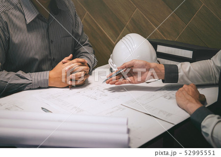 Construction engineering or architect discuss a Construction engineering or architect discuss a 52995551